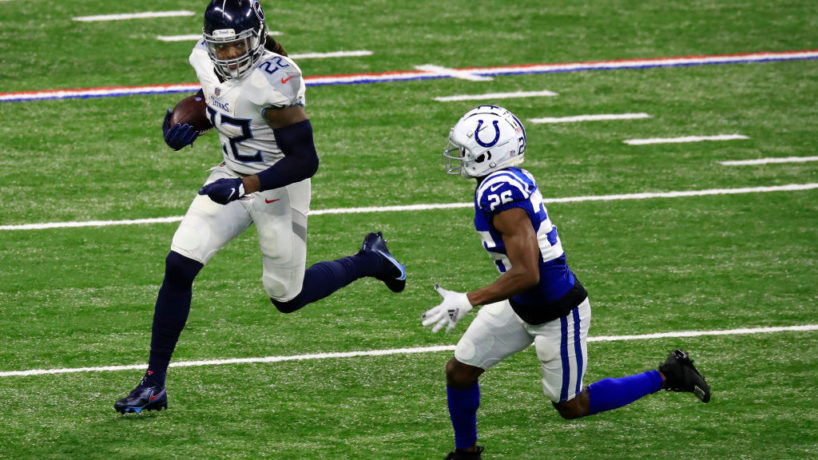 Derrick Henry running away from Rock Ya-Sin