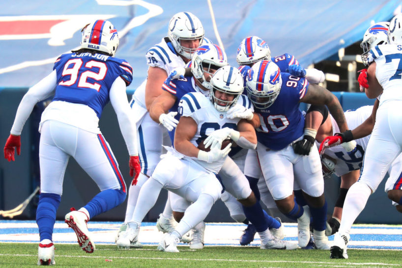 Trey Burton being tackled