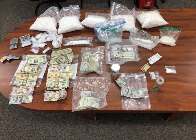 Crystal meth, other drugs, and money taken by police from a home in rural Washington County.