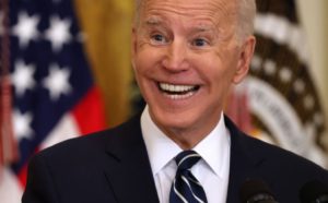 U.S. President Joe Biden talks to reporters during the first news conference of his presidency in the East Room of the White House on March 25, 2021 in Washington, DC. On the 64th day of his administration, Biden, 78, faced questions about the coronavirus pandemic, immigration, gun control and other subjects. (Photo by Chip Somodevilla/Getty Images)