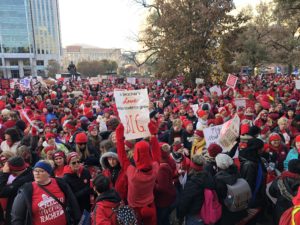 Teachers at a statehouse "Go Red for Ed" rally in 2019