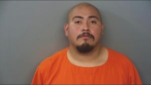 A booking photo of Adam Lopez of California