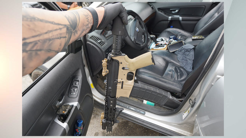 IMPD Arrests Men Seen Waving Guns Out Windows, Sunroof During Funeral Procession - Vimarsana News