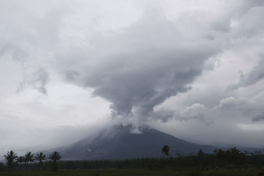 Volcano Rescue workers Dig Through Layers Of Hot Ash In Indonesia After Mount Semeru Erupts - Vimarsana News