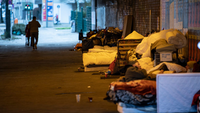 Homeless people in Berlin, Germany, squat in cold temperatures under the bridge of the S-Bahn line near Stuttgarter Platz at Charlottenburg station.