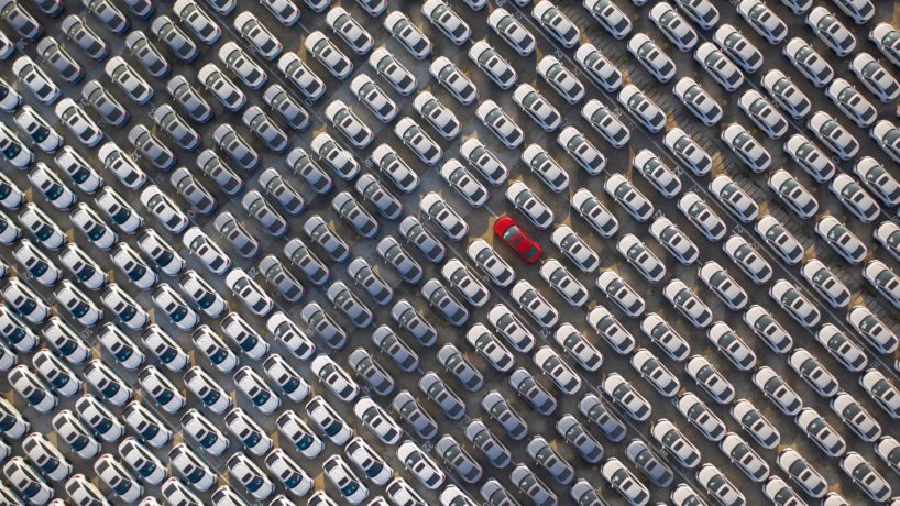 Aerial view of new cars parking at a production base