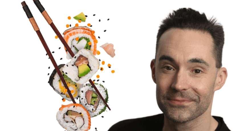 Brian Baker pictured with Pieces of delicious japanese sushi frozen in the air. Isolated on white background