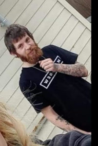 Kyle Moorman with a beard and t-shirt