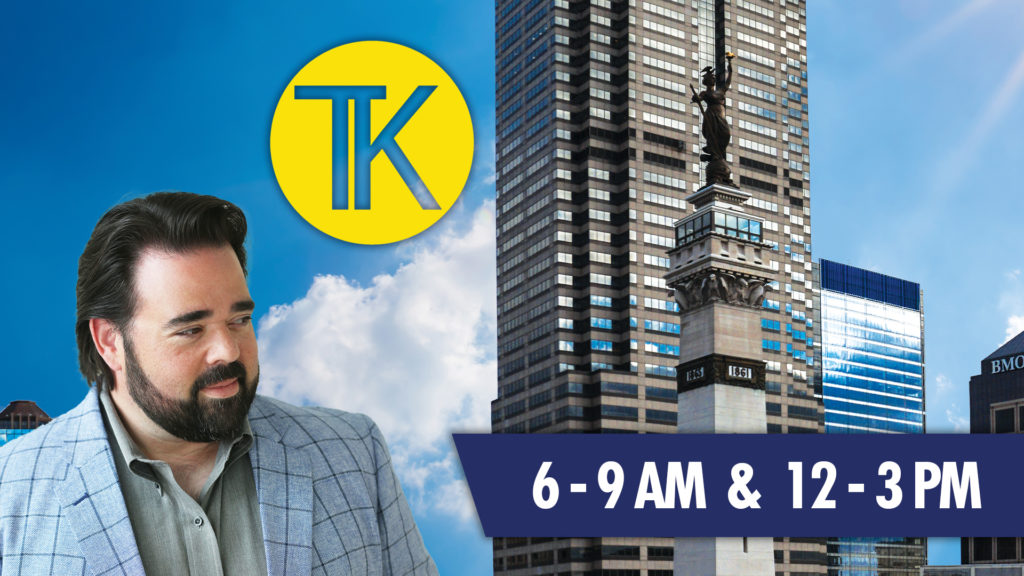 tony katz in Downtown Indy with a name banner