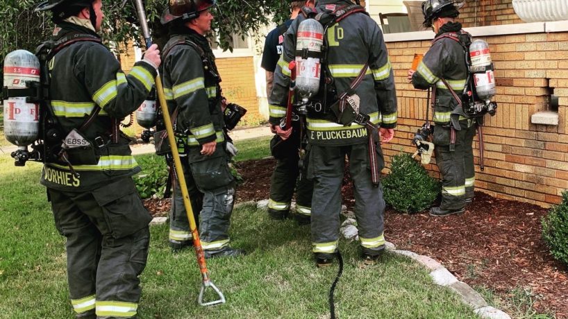group of firefighters standing together
