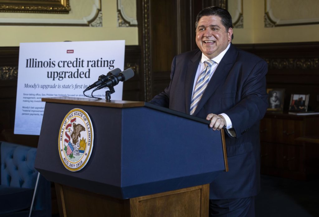 FILE - Illinois Gov. JB Pritzker discusses Moody's upgrade of the state's bond rating, the first rating upgrade from a credit rating agency in more than 20 years, during a press conference in the governor's office at the Illinois State Capitol in Springfield, Ill., Tuesday, June 29, 2021. (Justin L. Fowler/The State Journal-Register via AP)