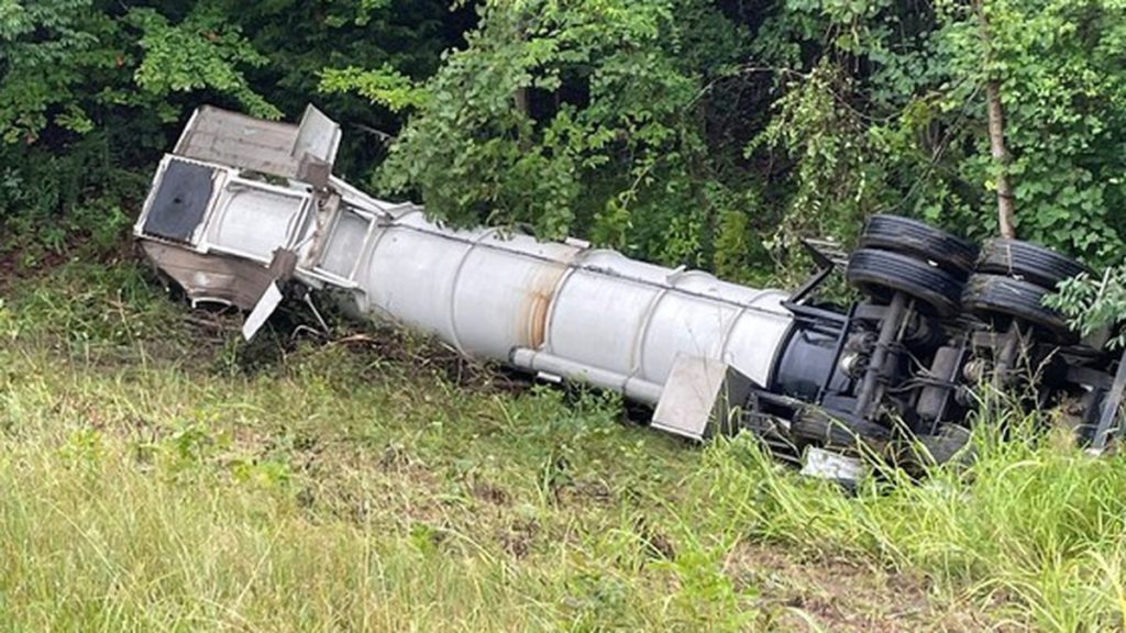 Woman hurt when car slides under semi Newsradio WJPF