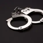 handcuffsonablackbackground