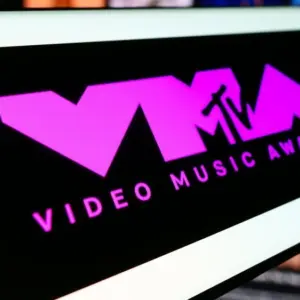 Mobile phone with logo of award show MTV Video Music Awards (VMA) in front of website. Focus on center-left of phone display. Stuttgart^ Germany - 03-19-2024