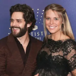 Thomas Rhett (L) and wife Lauren Akins attend the 2019 CMT Artists of the Year at Schermerhorn Symphony Center on October 16^ 2019 in Nashville^ Tennessee.