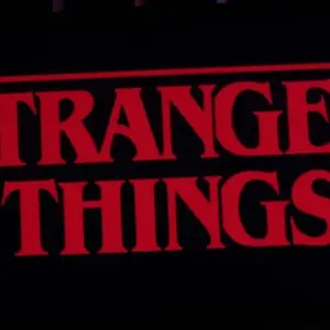 Iphone 11 pro with the Stranger Things logo on top of a computer keyboard. United States^ New York. Sunday^ September 29^ 2019.