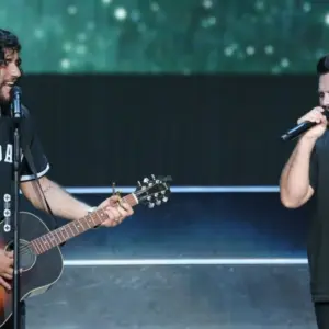 Dan Smyers (L) and Shay Mooney of Dan + Shay perfor during the "Can't Say I Ain't Country" Tour on July 20^ 2019 at Northwell Health at Jones Beach Theater in Wantagh^ New York.