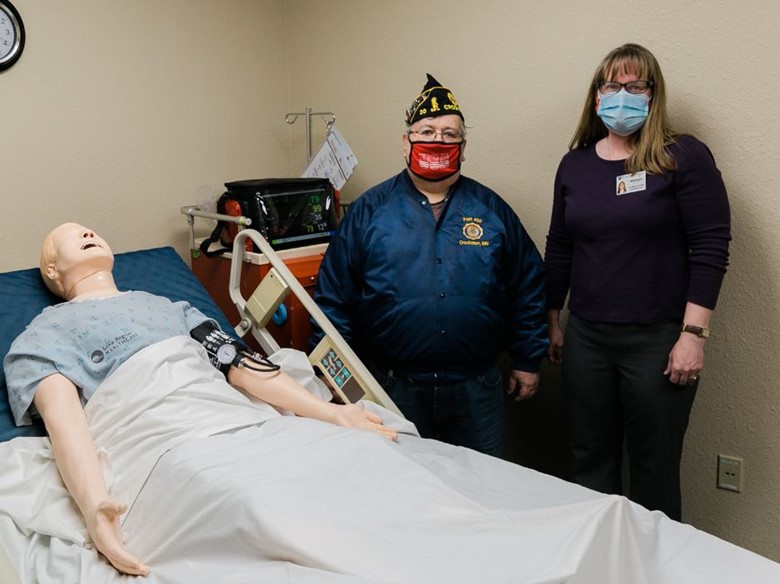 riverviews-new-cpr-manikin-named-megacode-kelly-paul-dubuque-commander-crookston-american-legion-post-20-and-wendy-oanes-riverview-training-center-coordinator