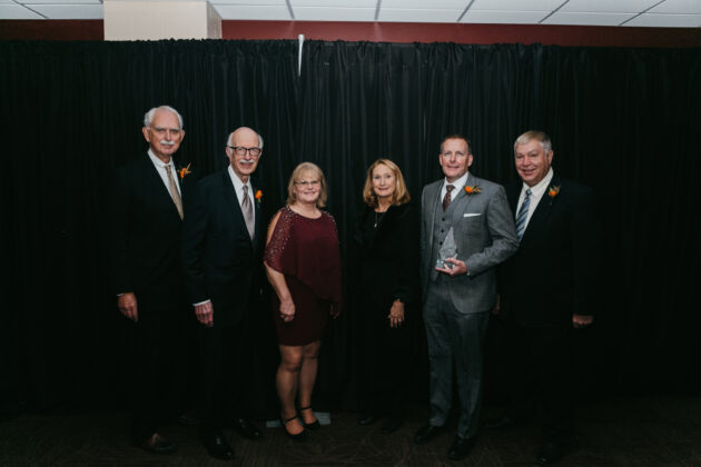 2021umctorchshield-103-630x420-1