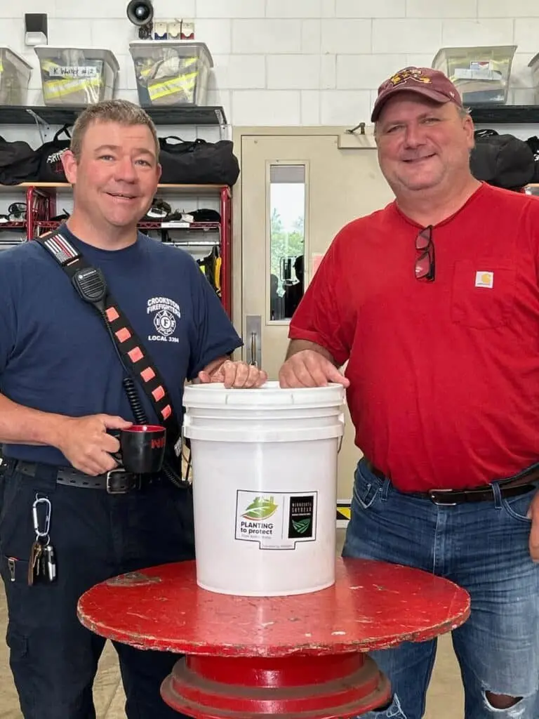 trevore-brekken-with-crookston-full-time-firefighter-brian-hanson-768x1024628779-1