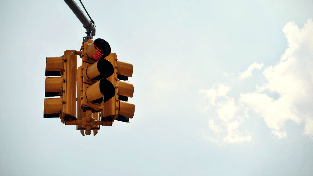 red-traffic-light-bunched-on-overhead-pole