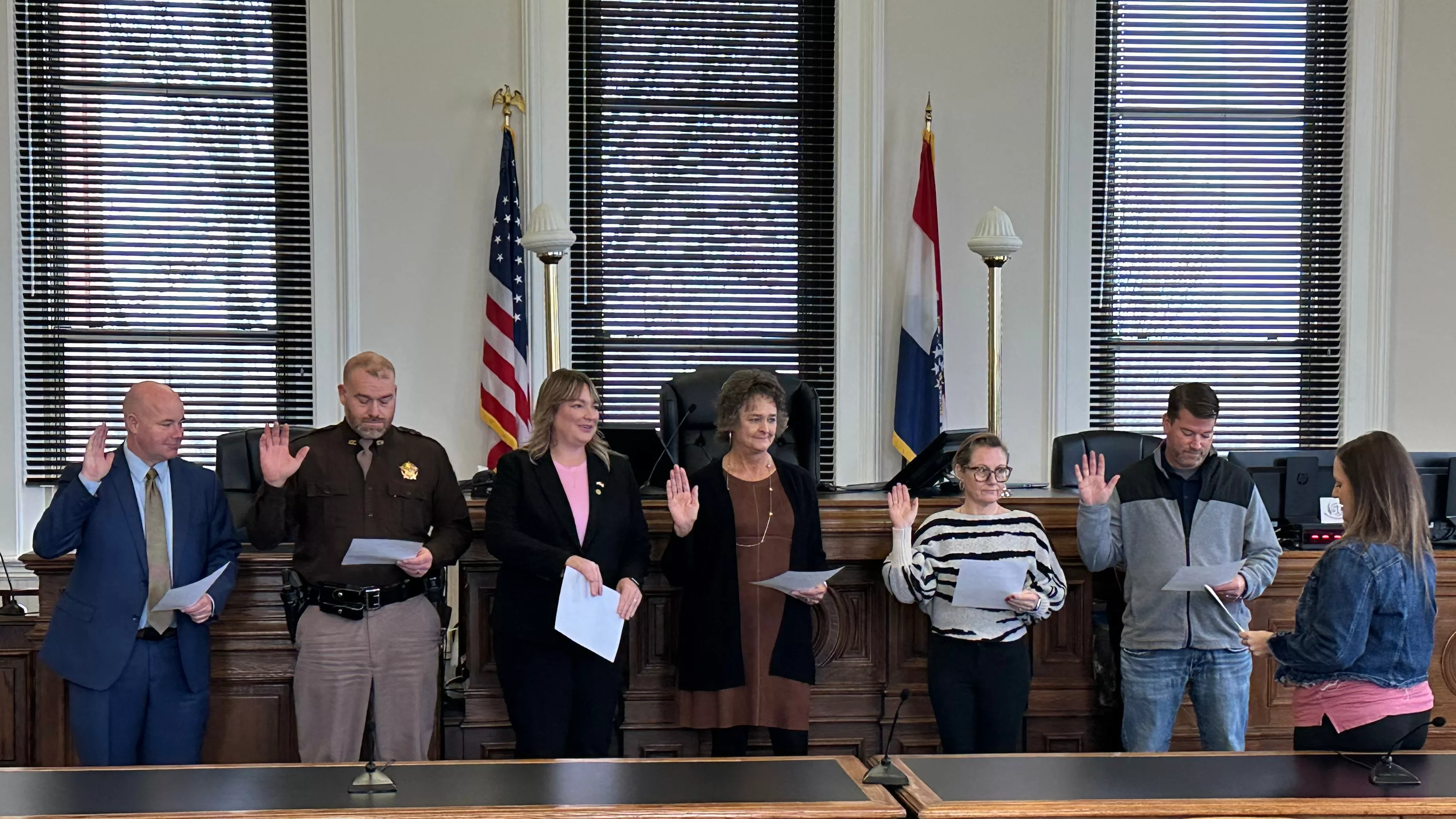 Six Saline County officeholders take their oaths of office Dec. 31, 2024 during a brief ceremony in the Saline County Courthouse. (Photo by Kyle Hill, KMMO News)