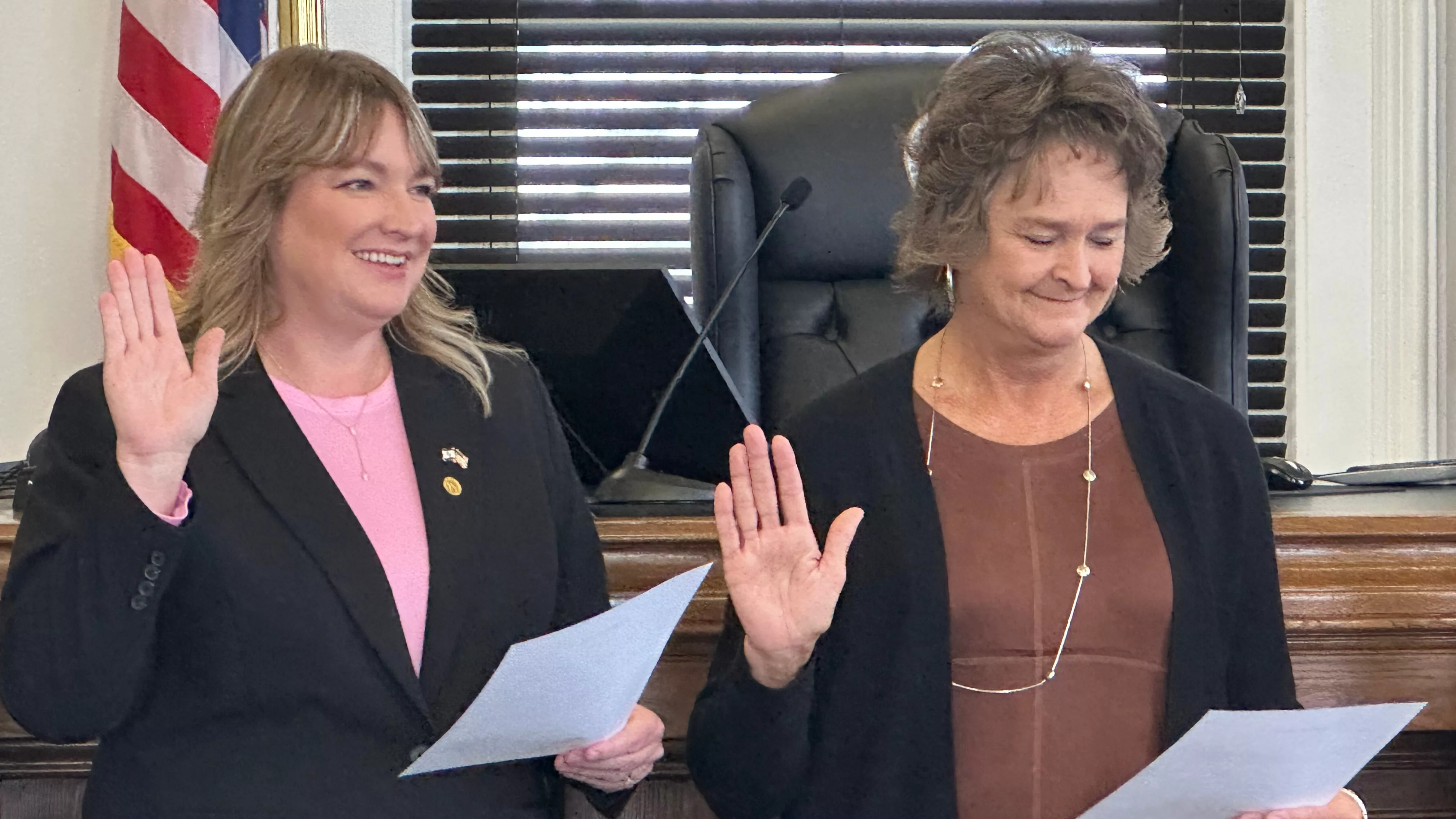 Saline County Northern District Commissioner Stephanie Gooden and Public Administrator Paula Barr take the oath of office (photo by Kyle Hill, KMMO News)