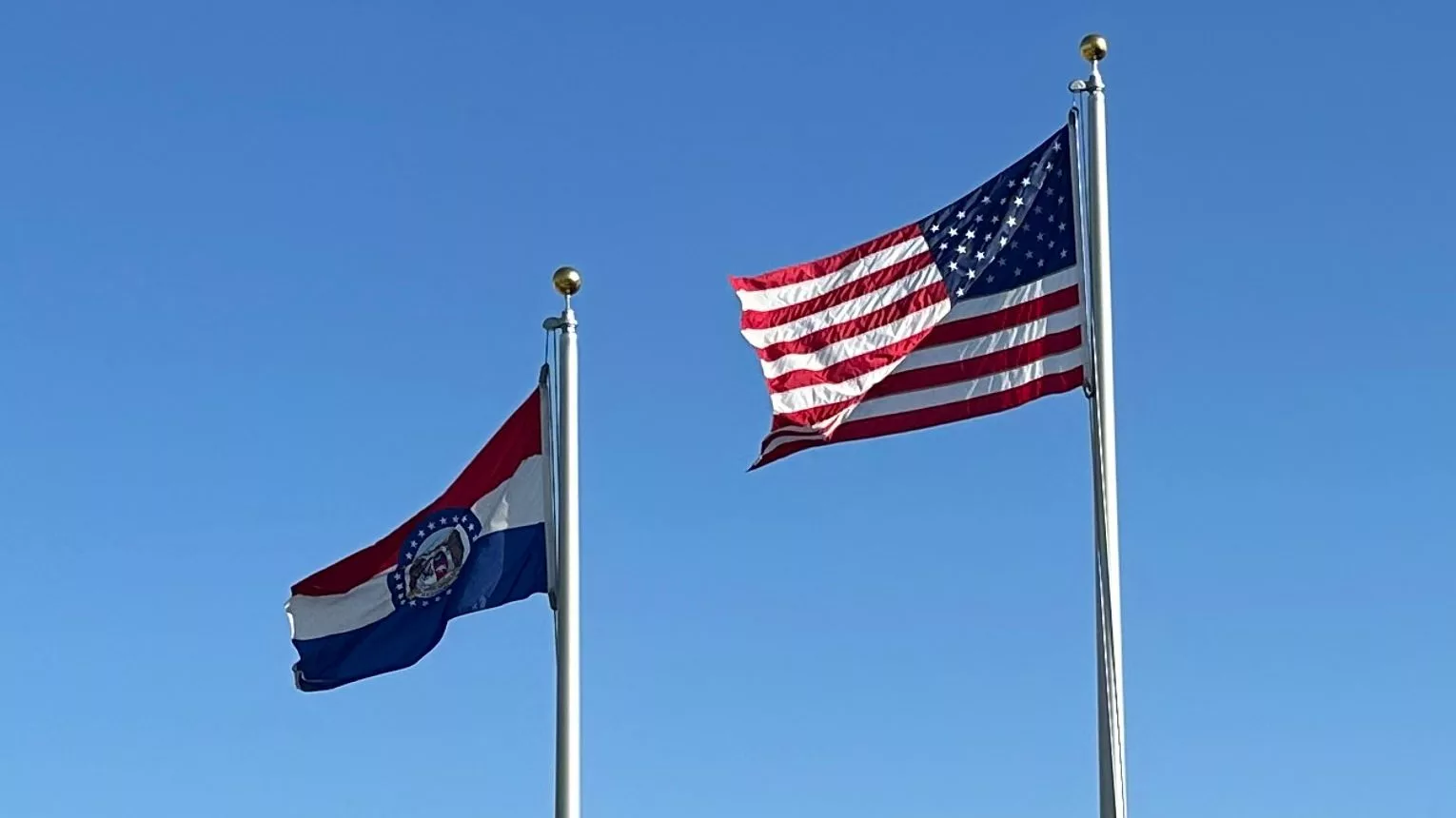 24-1003-marshall-ch-new-flagpoles-cu-of-flags