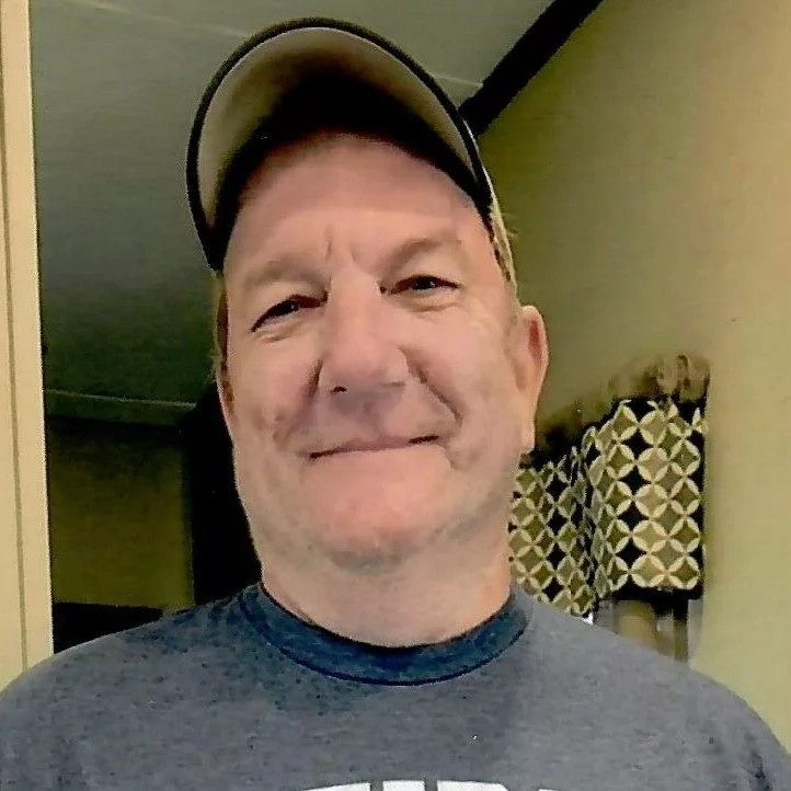 MICHAEL “MIKE” ADCOCK