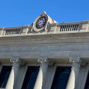 25-0127-clock-stone-sign-atop-pettis-co-courthouse
