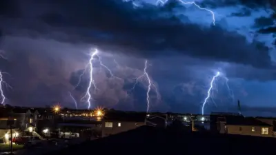 Four lightning bolt strike during a thunderstorm on Long Beach Island^ NJ.