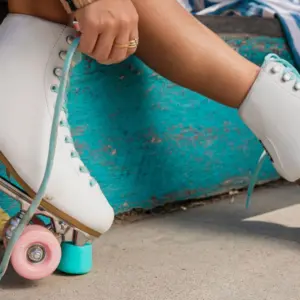 woman-tying-roller-skates