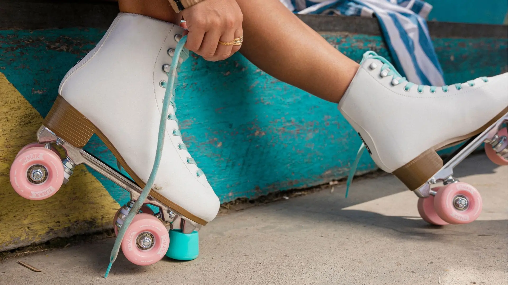 woman-tying-roller-skates