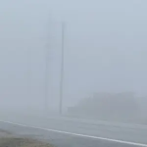 25-1223-truck-driving-through-fog-on-us65