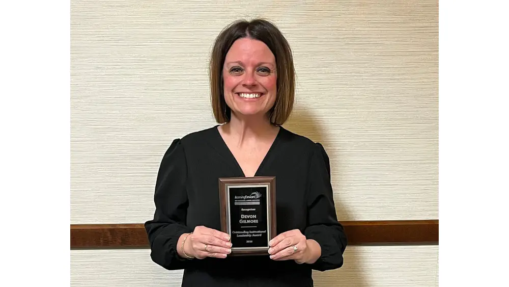 AREA ELEMENTARY CURRICULUM DIRECTOR RECEIVES EDUCATION LEADERSHIP AWARD