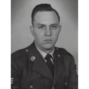 JOHN E. SPRADLEY