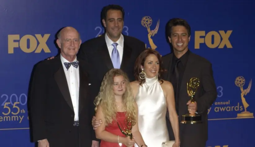 'Everybody Loves Raymond' stars PETER BOYLE (left)^ BRAD GARRETT^ MADYLIN SWEETEN^ PATRICIA HEATON & RAY ROMANO at the 55th Annual Emmy Awards in Los Angeles. Sept 21^ 2003