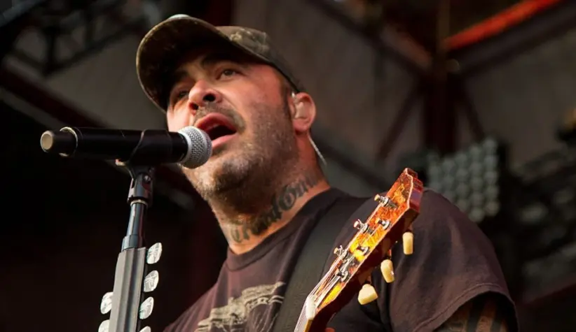 Aaron Lewis plays his guitar druing the performance of Staind Rockstar Uproar Festival on September 25^ 2012 in Nampa^ Idaho.