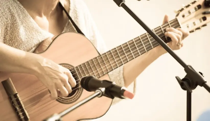 Woman with guitar/toned photo