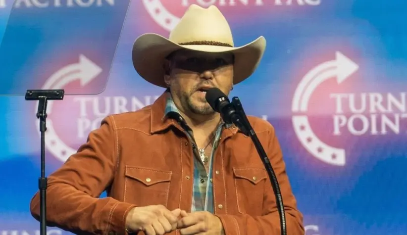 Jason Aldean speaks at a Donald Trump election rally at the Gas South Arena in Duluth^ Georgia. Duluth^ Georgia^ October 23^ 2024