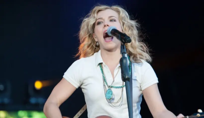 Kimberly Perry of The Band Perry performs in part of Brad Paisley's Virtual Reality Tour 2012 at Sleep Train Amphitheatre on July 26^ 2012 in Wheatland^ California.