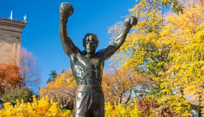 PHILADELPHIA^ PENNSYLVANIA - NOVEMBR 16^ 2016: The Rocky Balboa statue during autumn. The statue commemorates the The Rocky film series which has become a cultural icon.