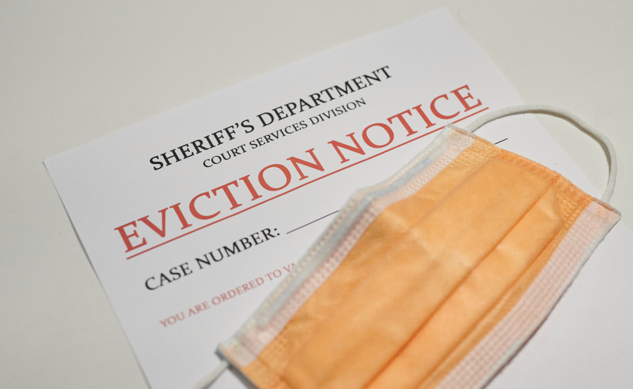 yellow-facial-mask-laying-on-top-of-the-eviction-note-from-sheriffs-department