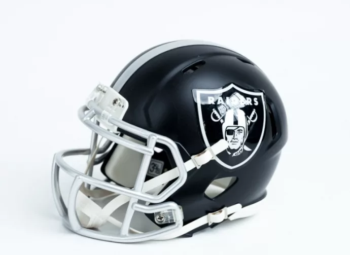 Las Vegas Raiders NFL team helmet on white background.