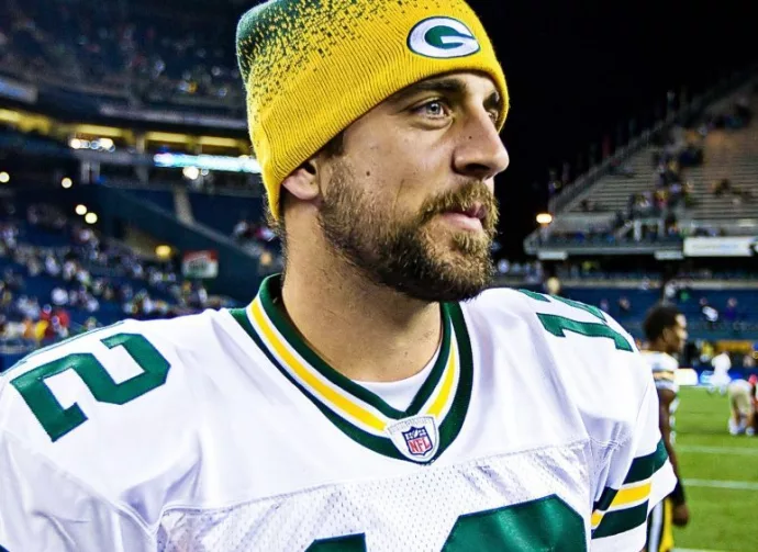 Quarterback Aaron Rodgers walks on Qwest Field after winning a football game August 21^ 2010 in Seattle^ Washington.