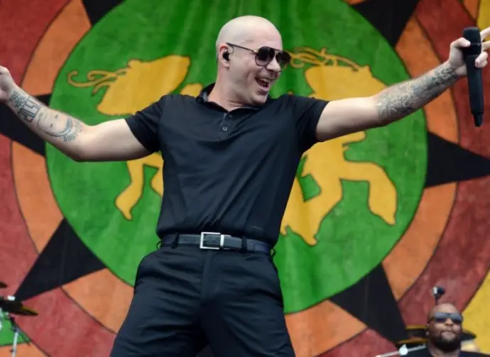 Armando Christian Pérez^ known professionally as Pitbull^ performs onstage at the 2015 New Orleans Jazz and Heritage Festival. New Orleans^ Louisiana - April 26^ 2015