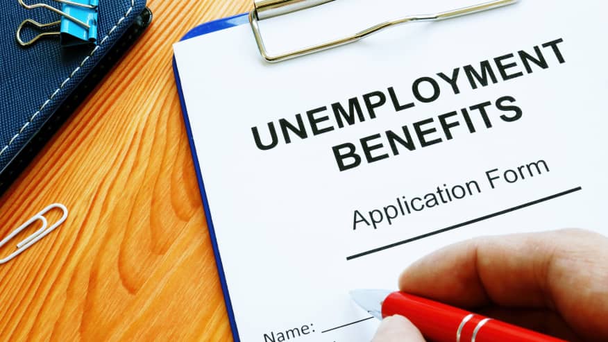 man-fills-in-unemployment-benefits-application-form