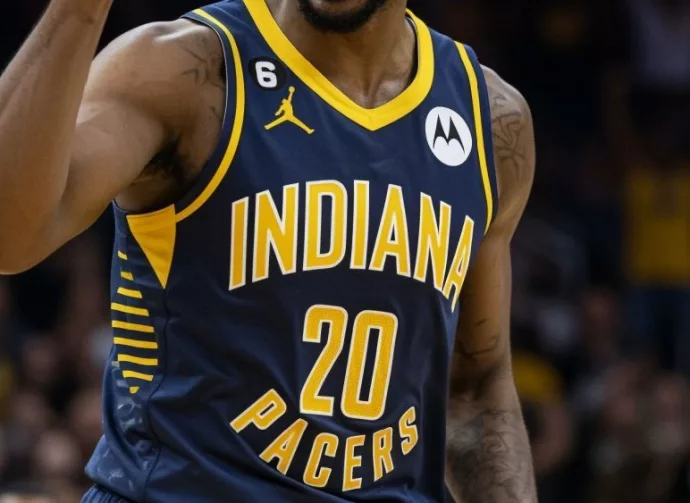 professional male nba basketball indiana pacers player^ screaming^ pointing finger up