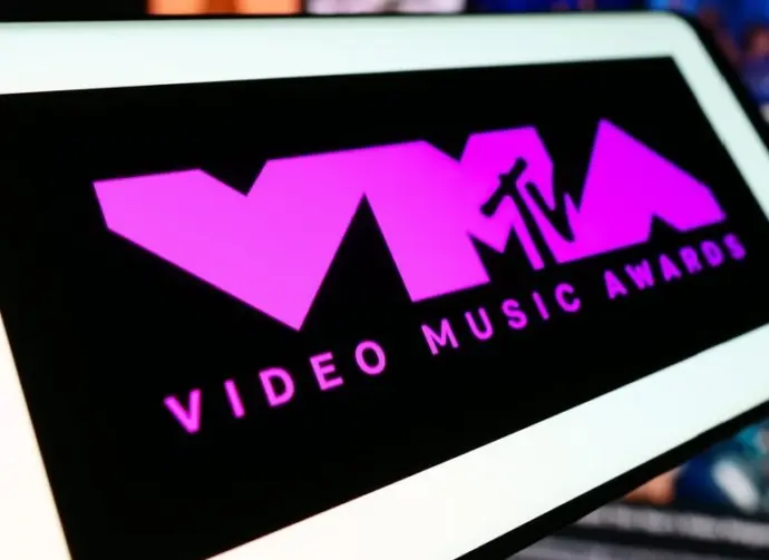 Mobile phone with logo of award show MTV Video Music Awards (VMA) in front of website. Focus on center-left of phone display. Stuttgart^ Germany - 03-19-2024