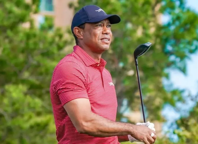 Tiger Woods watches his tee shot off the 10th hole during the final round of the PNC Championship at the Ritz-Carlton Golf Club on December 22^ 2024.